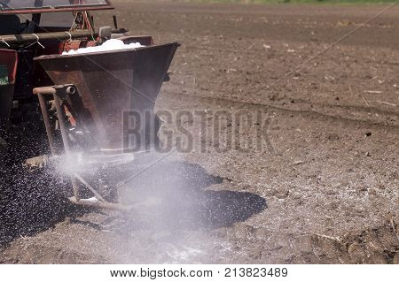 arable land field landscape with tractor machine