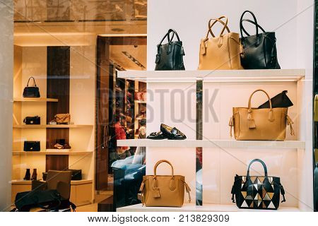 Fashion Accessories In Shop Window Showcase Of Store Mall Market.