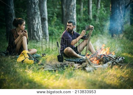 Man Hipster Sharpen Axe