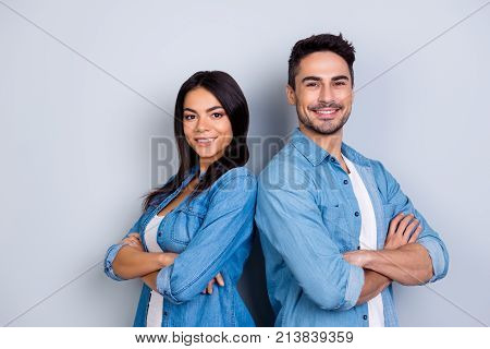 Concept Of Multiethnic Cooperation And Friendship. Attractive Delightful Hispanic Woman In Denim Clo