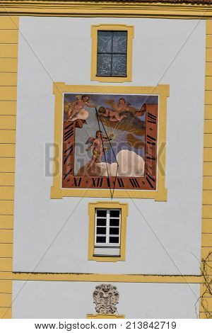 historic sundial on a facade