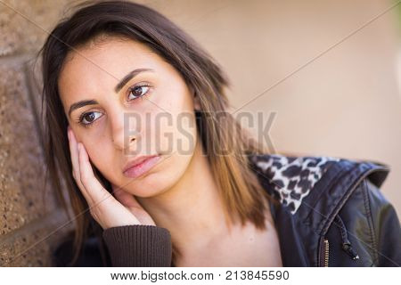 Beautiful Meloncholy Mixed Race Young Woman Portrait Outside.