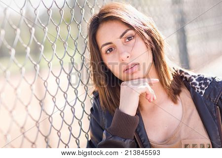 Beautiful Meloncholy Mixed Race Young Woman Portrait Outside.