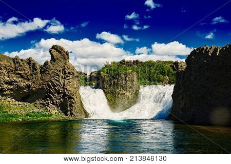 famous Hjalparfoss waterfall in southern Iceland. treking in Iceland. Travel and landscape photography concept