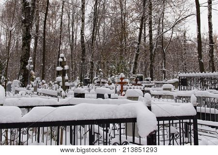 Old Red (Bugrovsky) cemetery in the Nizhny Novgorod at winter. Russia. The present cemetery was planned at the turn of the 1880s-90s. The actual formation occurred during the First World War.
