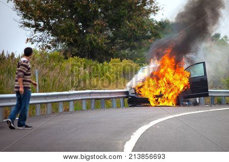 Car On Fire With Passengers