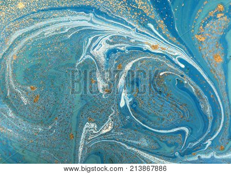 Marbled Blue Abstract Background With Golden Sequins. Liquid Marble Ink Pattern.