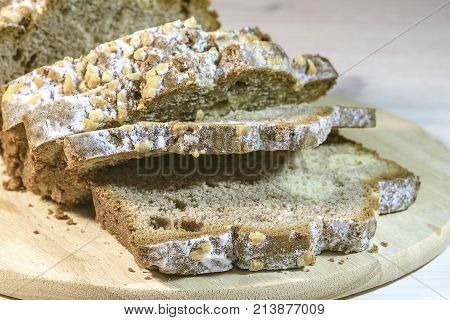 fresh home baked cake sliced and dusted with powdered sugar. Macro