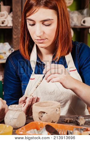 Woman Potter Sculpts