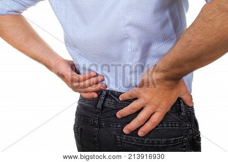 Close up picture of a young man having a serious back pain