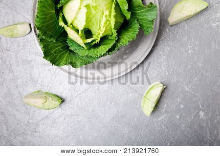 Fresh Green Cabbage In Metal Plate On Grey Background. Top View. Copy Space.
