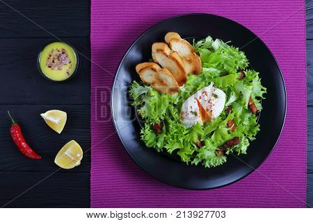 Lettuce, Crispy Bacon And A Poached Egg Salad