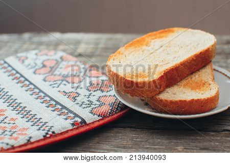 On Wooden Background, On The Boards Of Toasted Bread