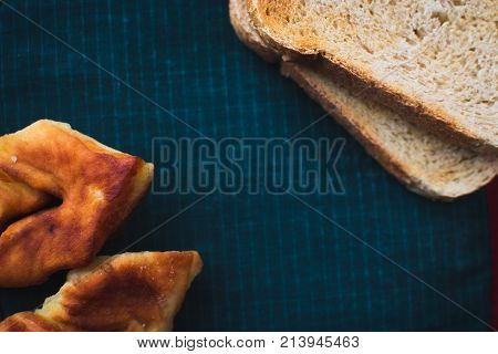 On Wooden Background, On The Boards Of Toasted Bread