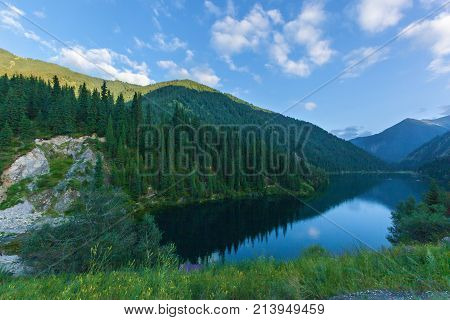 Beautiful view of high mountain lake Kolsai in Kazakhstan, central Asia