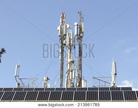 Three mobile phone communication tower transmission signal.