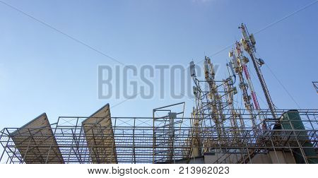 Three mobile phone communication tower transmission signal.