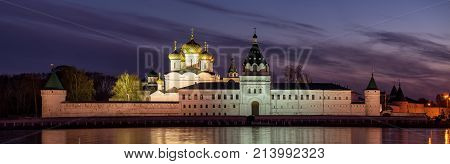 Panoramic view of the illuminated Ipatiev Monastery in the evening Kostroma Russia