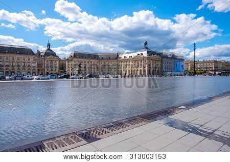 Bordeaux, France - May 5, 2019: The Miroir Deau Or Miroir Des Quais On The Quay Of The Garonne In Fr