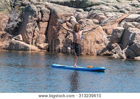 Stand Up Paddle On A Lake