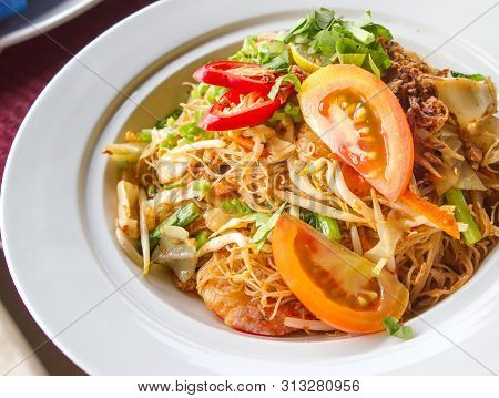 Stir-fry Rice Noodles On A White Table