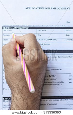 Hand Filling Standard Application For Employment. Hr, Hiring, Applicant Filling Job Application. Hr,