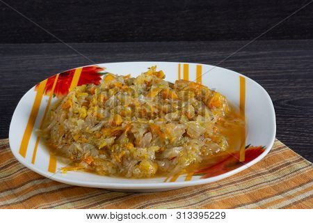 Stewed Cabbage With Carrot And Onion On The Plate