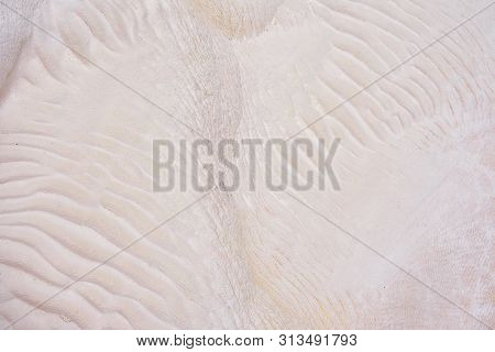 Undulatory Texture Of White Calcite Stalactites Covering A Cascade Of Terraced Baths In Pamukkale, T