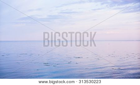 The Sky Touches The Earth During The Sunset At The Bay