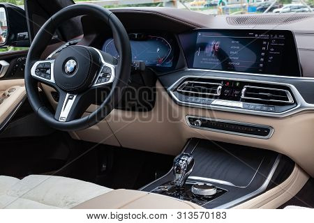 Novosibirsk, Russia - 07.20.2019: View To The White And Brown Interior Of Bmw X7 M Performance With 