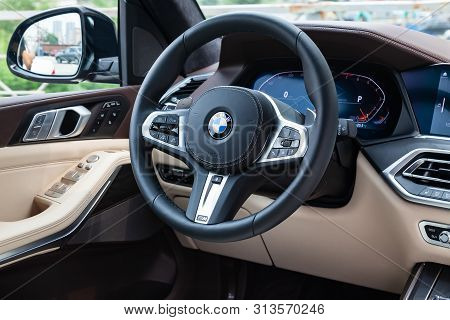 Novosibirsk, Russia - 07.20.2019: View To The White And Brown Interior Of Bmw X7 M Performance With 
