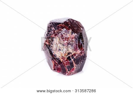 Macro Of A Mineral Garnet Stone On A White Background