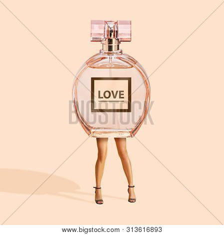 Smell Of Love. Woman With The Body As A Parfume On Yellow Background. Fashion Concept. Negative Spac