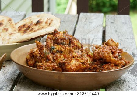 Veiw Of  Homemade Tava Chicken With Green Raita Chutney And Tandoori Roti