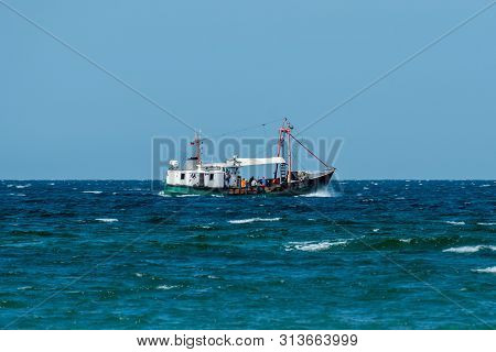 Fishing Boat On The Baltic Sea On A Bright Sunny Day With Clear Skies