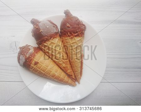 Tasty And Sweet Ice Cream Sundae In A Waffle Cup. The Tastiest Food.