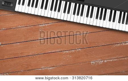 Musical Instrument - Fragment Closeup Midi Piano 61 Key Keyboard On A Wooden Background