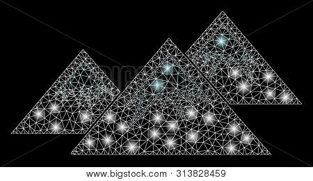 Glowing Mesh Icecap Mountains With Sparkle Effect. Abstract Illuminated Model Of Icecap Mountains Ic