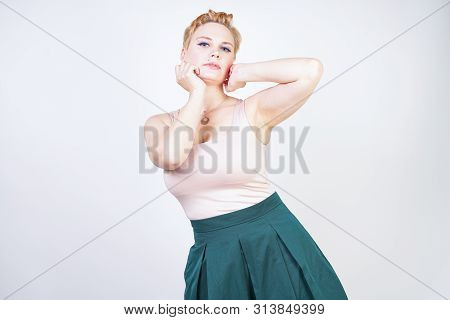 Pin Up Curvy Girl In Green Pleated Midi Skirt On White