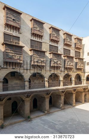 Cairo, Egypt- January 1 2017: Facade Of Historic Caravansary Of Bazaraa, With Vaulted Arcades And Wi