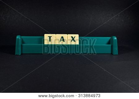 Tax Word Demographic Image Using By Block Letter For Various Purpose Of Tax Return Or Tax Related Wo
