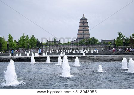 The North Square Tang Cultural Area Water Fountain And Great Wild Goose Pagoda In Shaanxi Province O