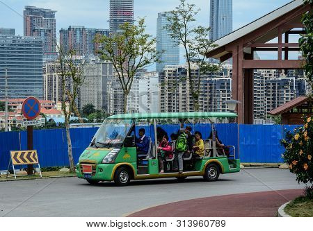 Nanning, China - Nov 1, 2015. Electric Cart Waiting For Passengers In Front Of The Botanic Garden In