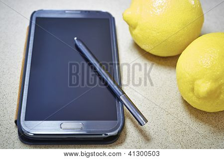 Smart telefon och citroner