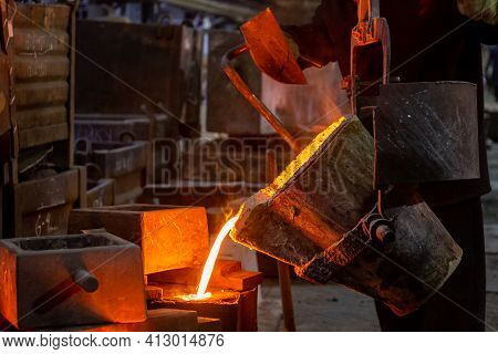 Industrial Chill Casting. The Process Of For Filling Out Mold With Molten Metal.