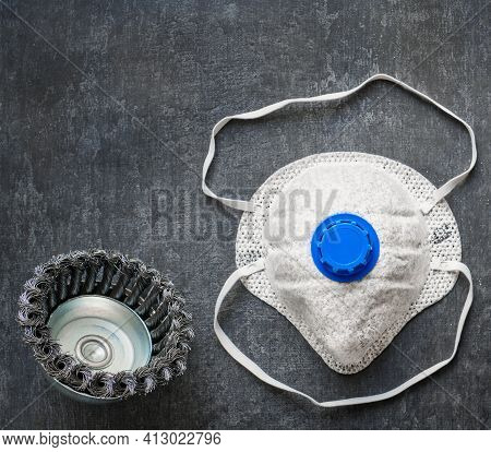 Respirator And Steel Round Brush For Machining Metal Surfaces