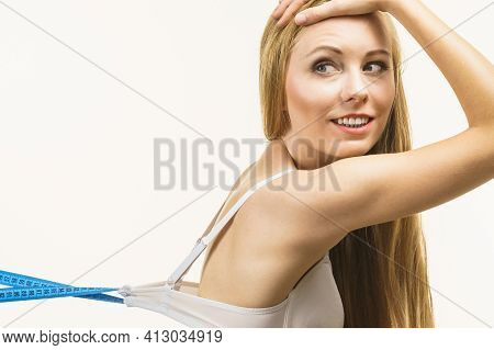 Woman Wearing Too Big Bra, Loose Band