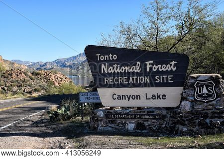 TORTILLA FLAT, ARIZONA - DEC 8, 2016: Sign at the entrance to Canyon Lakea. In the Tonto National Forest the lake is formed by the Mormon Flat Dam on the Salt River.