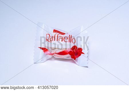 Tyumen, Russia-march 15, 2021: Candy Raffaello Close Up From The Copy Space. White Background