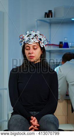 Specialist Neurologist Doctor Taking Notes On Laptop Asking Patients Symptoms Adjusting High Tech Ee
